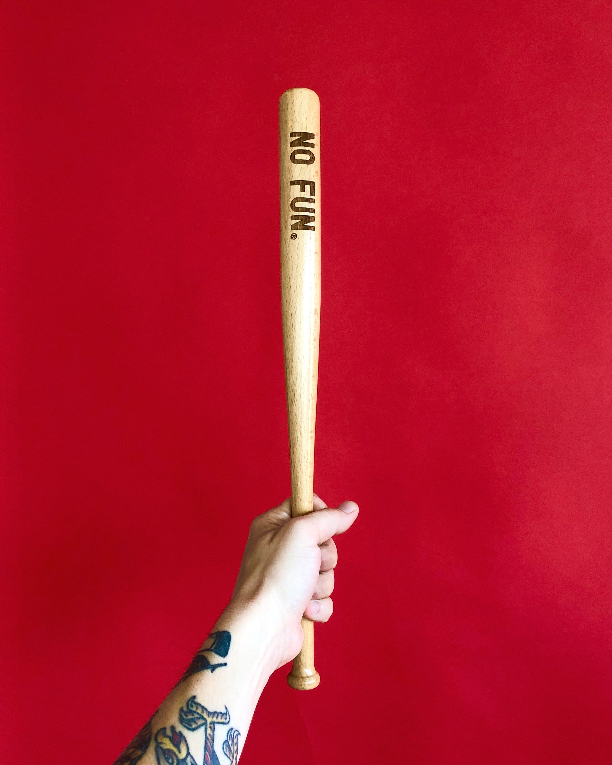The original "NO FUN®" mini bat.  The bat measures 18" long and features a laser engraved "NO FUN®" logo near the top of the barrel.   
