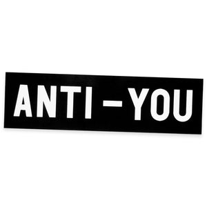 No Fun Press "Anti-You" bumper sticker. Text reads "Anti-You." Perfect for those days where you LOVE everybody stuck in traffic with you.  Screenprinted in black and white. 7" x 2".  Custom-designed in Toronto, Canada.
