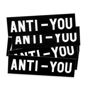 A pile of the No Fun Press "Anti-You" bumper stickers. 