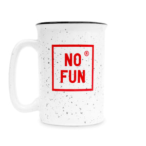 The "Life Is Hell" ceramic Camp Mug against a white background. Mug is white with black speckle and black contrasting rim, and features red silkscreen print on both sides. This photo showcases the printed "No Fun®" logo. 