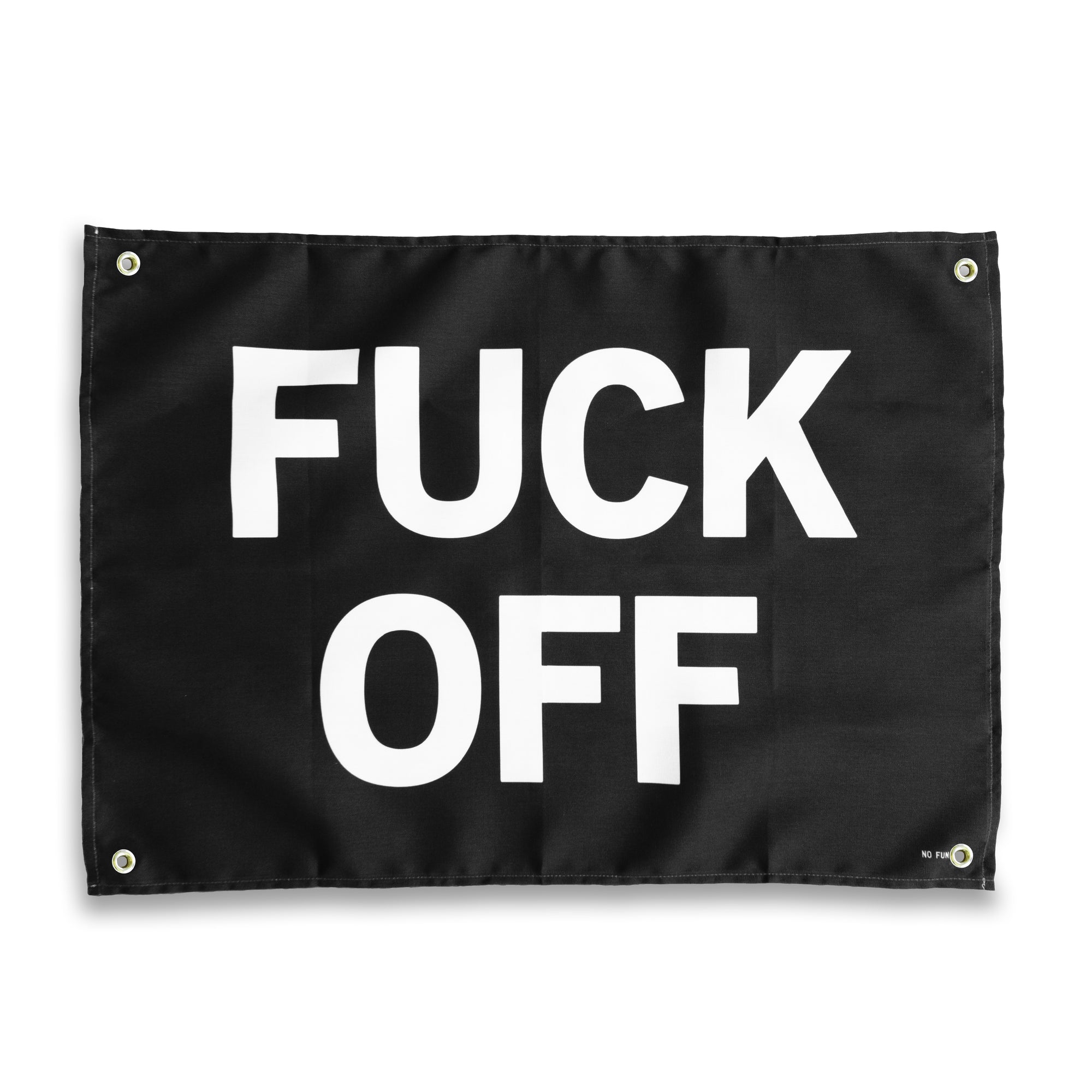 The "Fuck Off" Wall Tapestry by No Fun®.  Tapestry is black, with the phrase "FUCK OFF" printed in large white letters.  There is a small "No Fun®" logo in the bottom right hand corner.  There is 1 brass grommet in each corner of the tapestry.