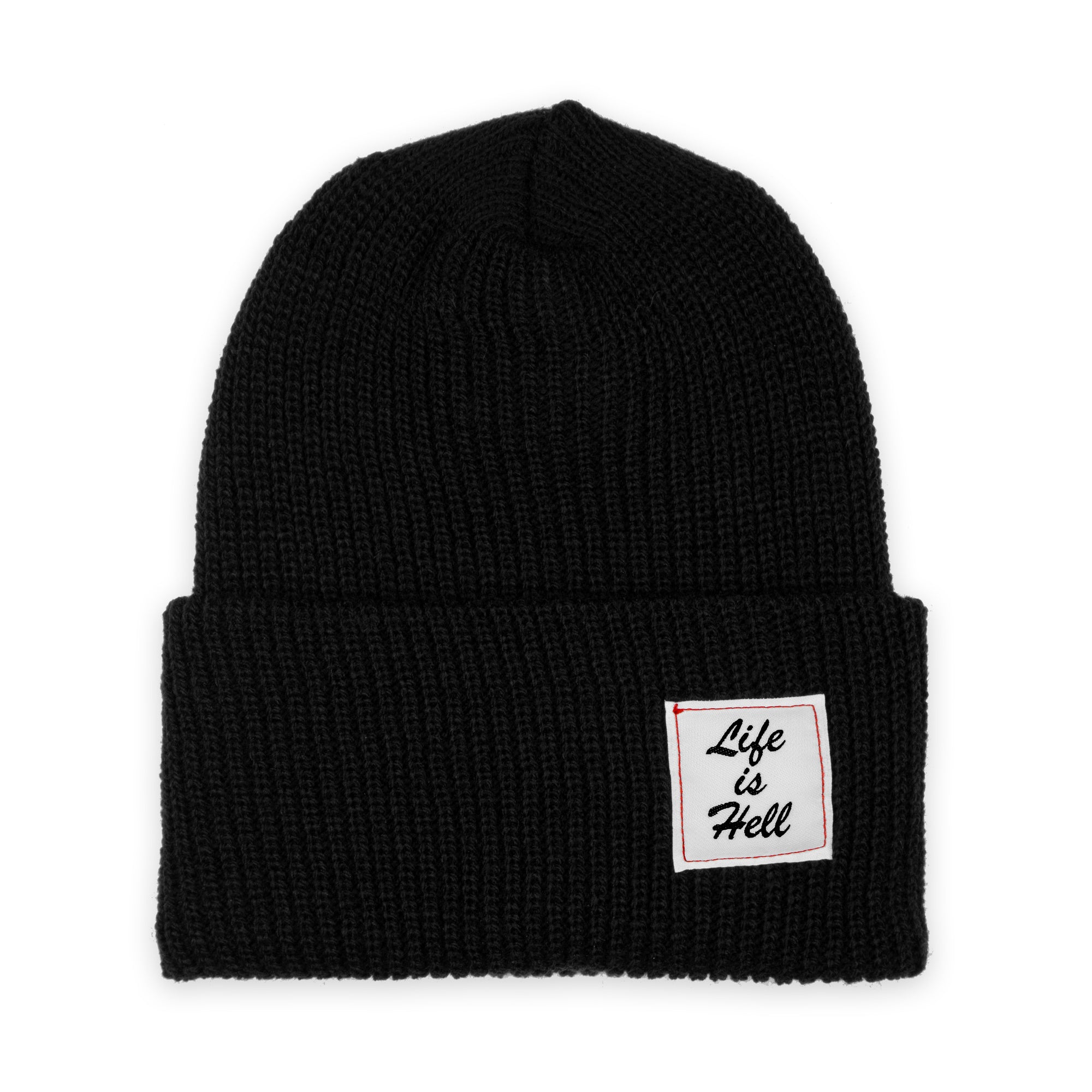 Photo of the "Life is Hell" Beanie by No Fun®.  Product is photographed against a white background.  Beanie is black, and features a small white woven label on the cuff that reads "Life Is Hell".  Label is white, with black text, and red contrasting stitching.