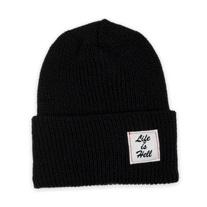 Animated Gif of the "Life Is Hell" Beanie by No Fun®.  The animation showcases all 4 available colours of the beanie in the following order:  Black, Navy, Olive Drab, Desert tan.  The hats are all showcased against a white background.  The beanies feature a small, white, woven label on the cuff that reads "Life Is Hell" in black brush script font, with red contrasting stitching.
