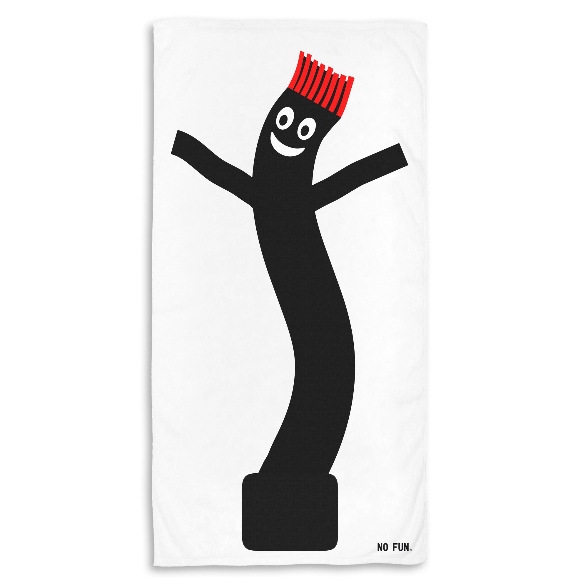 The "Wacky Wavy" Beach Towel by No Fun®. The towel is white, and features a large, black, "Wacky Waving" tube man graphic. The tube man has red hair, and a smily face. There is a small, black, No Fun® logo in the bottom right hand corner of the towel.
