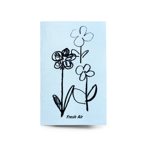 Cover of "Fresh Air" by Christian Stearry, a 20 page zine.  Photo features the cover of the zine, which showcases some illustrated flowers and the title "Fresh Air".
