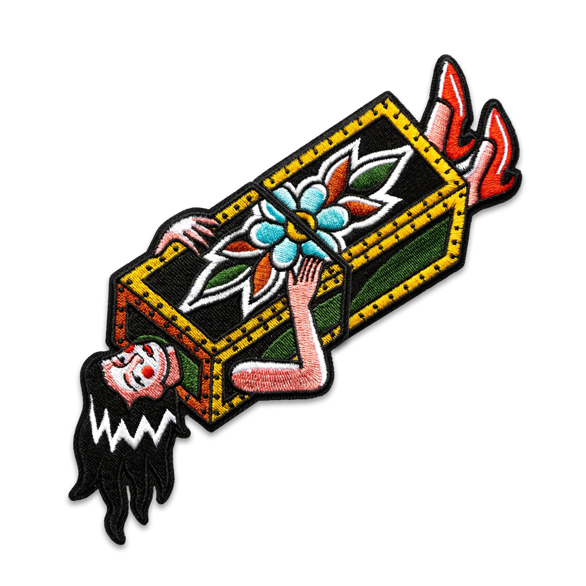 A two-part patch designed in collaboration with Brandon Ing. The iron-on patch depicts the traditional "sawing in half" magic trick. One half is woman's torso in a box, the other half is her feet. Patch is embroidered with multiple colors, and is inspired by classic tattoo flash designs.