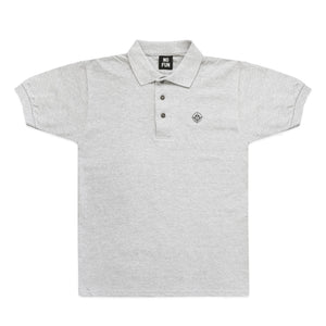 Grey polo shirt with small embroidered "Target" logo from No Fun®. Embroidery is of a smiley face in a crosshair, sized 1.25" diameter.