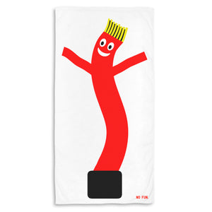 The "Wacky Wavy" Beach Towel by No Fun®.  The towel is white, and features a large, red, "Wacky Waving" tube man graphic.  The tube man has yellow hair, and a smily face.  There is a small, red, No Fun® logo in the bottom right hand corner of the towel.