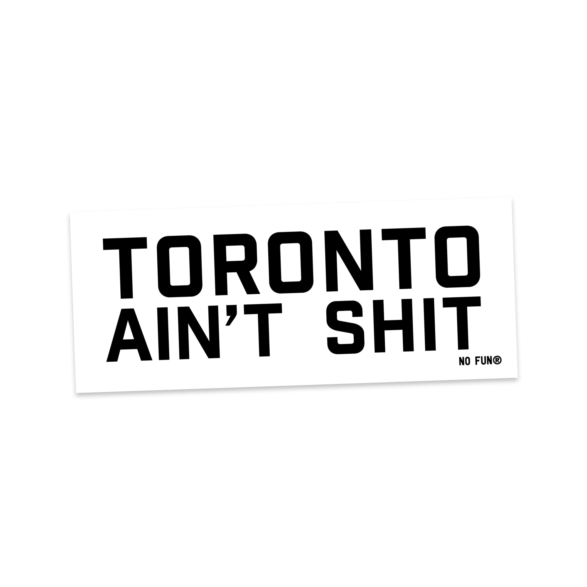 The "Souvenir" Bumper sticker by No Fun®. Sticker is white, with the phrase "Toronto Ain't Shit" printed in blue ink. There is a small No Fun® logo in the bottom right hand corner of the product.