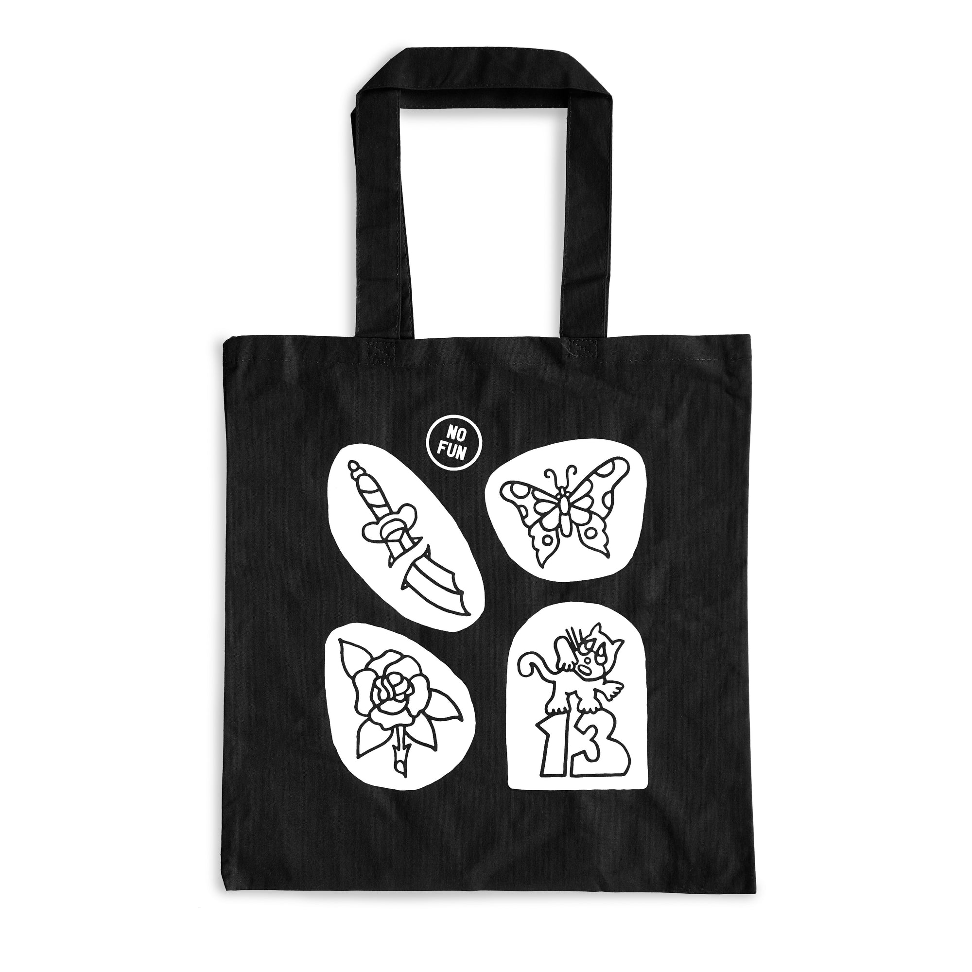 Photo of the No Fun® "Flash Sheet" Tote bag.  The bag is black with a white graphic, and photographed against a whit ebackground.  The design on the bag is four images that include: a 2 part dagger, a butterfly, a rose, and a cat atop a number "13".  There is also a small "No Fun®" logo near the top above the other designs.  The graphic has been inspired by traditional tattoo flash sheet artwork.
