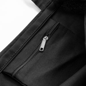 Detail of the inside zipper pocket, and main zipper, of the "Life is Hell" tote bag.